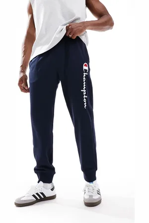 Champion Pantalones azules marino con bajos ajustados de canalé Authentic de