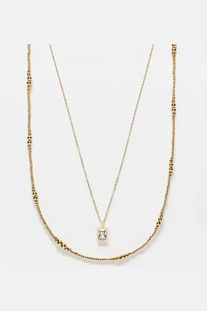 ASOS Pack de 2 collares dorados de cuentas con colgante de cristal de acero inoxidable de