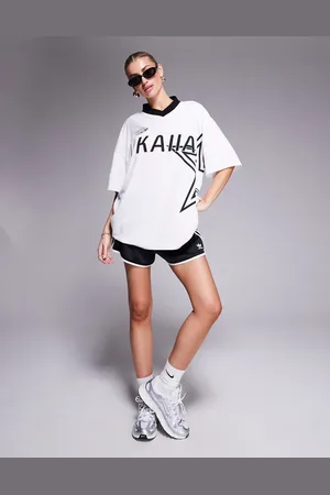 Kaiia Camiseta blanca y negra extragrande de estilo futbolero con estampado de estrella y logo de Sport
