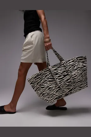 MANGO Bolso tote grande con estampado de cebra de
