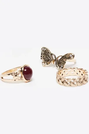 Reclaimed Pack de 3 anillos dorados con detalle de mariposa y piedra roja de imitación de