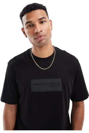 Armani Exchange Camiseta negra con logo en relieve en el pecho de