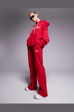 Kaiia Joggers rojos y blancos con logo de texto bordado de (parte de un conjunto)