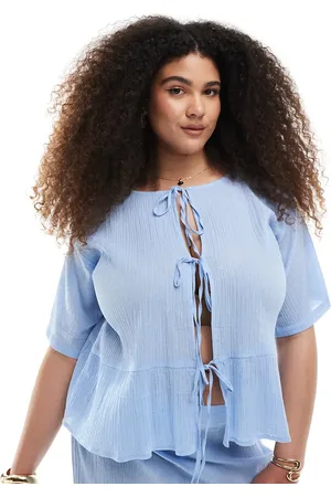 Esmée Top playero azul con lazadas delanteras exclusivo