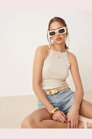 AWARE Top color sin mangas con bordes festoneados de punto fino de -Blanco