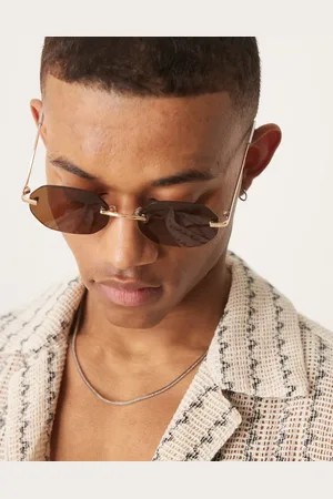 ASOS Gafas de sol con montura al aire, patillas doradas y lentes marrones redondas de