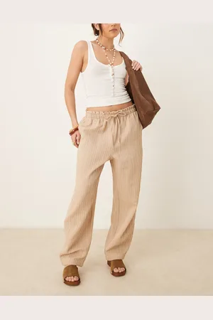 ASOS Pantalones de sastre color de pernera arqueada con cordón ajustable en la cintura de tejido texturizado de -Neutro