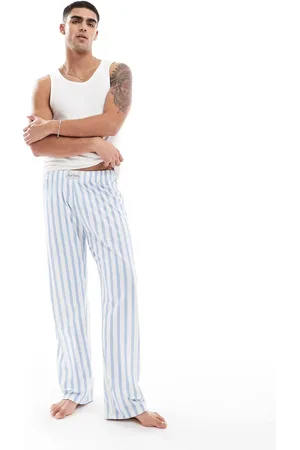 ASOS Pantalones de estar por casa a rayas azul medio de