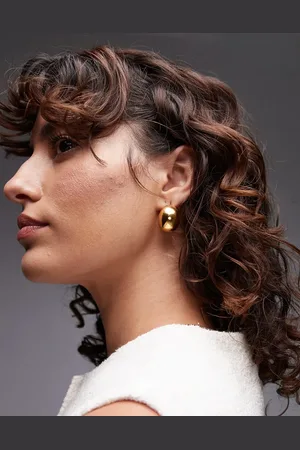 Topshop Pendientes dorados con diseño abovedado de acero inoxidable resistente al agua Sammy de