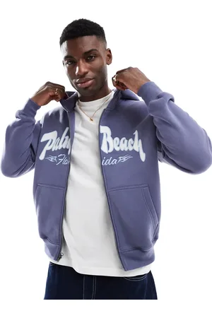 Hollister Sudadera holgada con capucha, cremallera y detalle estampado en la espalda de