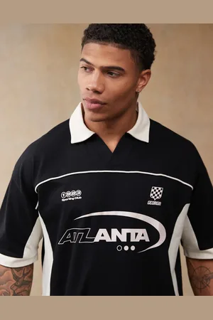 ASOS Polo extragrande con diseño de paneles cosidos y estampado gráficos deportivos de