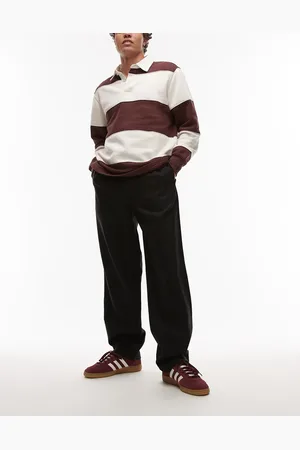 ARKET Pantalones negros de pernera holgada con cordón ajustable de tejido texturizado de