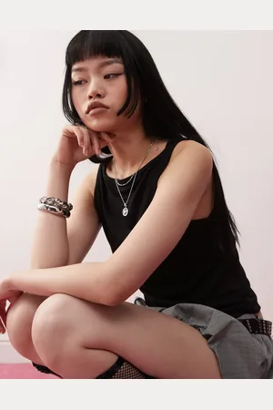 COLLUSION Camiseta negra sin mangas con cuello barco de tejido texturizado de