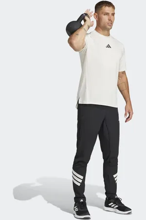adidas Pantalones negros y blancos con 3 rayas Icon de