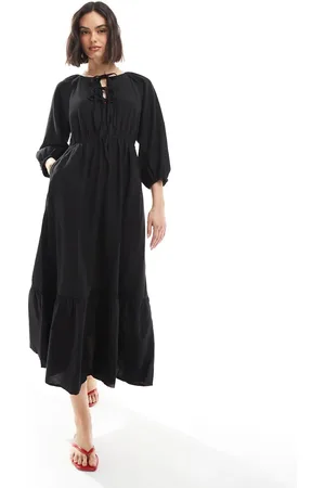 New Look Vestido midi escalonado de corte amplio con lazada delantera de