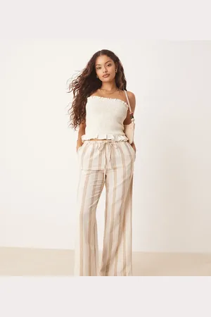 VILA Pantalones color crema a rayas color tostado de pernera ancha con lazada en la cintura de tejido efecto lino de -Neutro