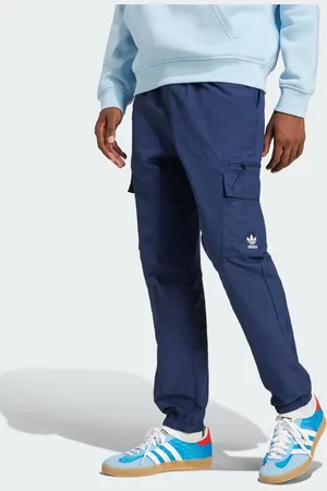 adidas Pantalones cargo azul añil nocturno básicos de tejido liso Trefoil Essentials de