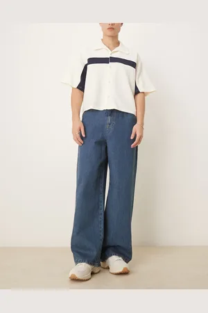 ASOS Vaqueros muy holgados con lavado azul medio y costuras retorcidas de -Azul marino