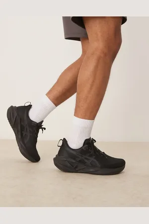 Asics Zapatillas de deporte negras y grises para correr Novablast 5 de