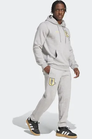 adidas Pantalones gris medio jaspeado con diseño del Manchester United VRCT de