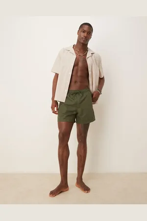 Abercrombie & Fitch Shorts de baño de 5" verdes con estampado de hojas de