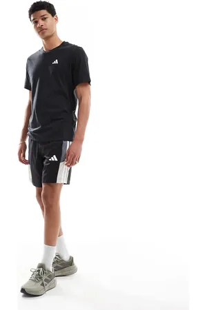 adidas Pantalones cortos negros y grises con diseño colog block y 3 rayas Essentials de adidas Training