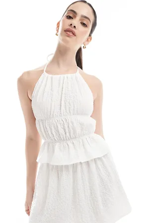 Esmée Top playero con cuello halter subido exclusivo de