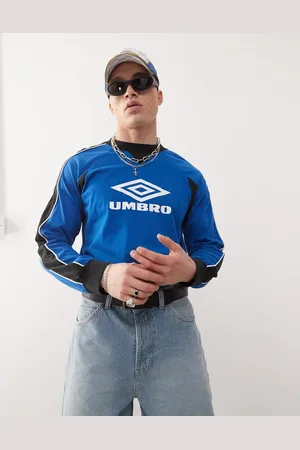 Umbro Camiseta azul y blanca de manga larga con detalle de paneles de