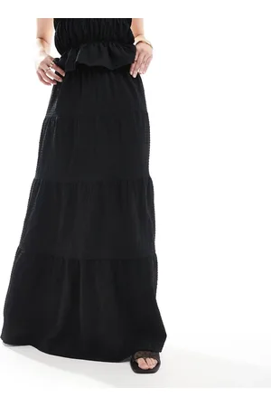Esmée Falda playera negra escalonada de tejido texturizado transparente exclusiva de (parte de un conjunto)