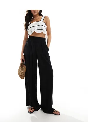 VERO MODA Pantalones negros de pernera ancha con vuelo y talle alto de