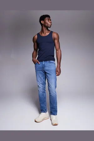 ASOS Vaqueros de corte slim con lavado azul medio tintado de