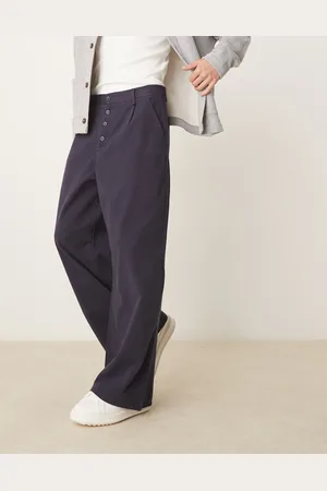 ASOS Pantalones azul marino de corte herradura con pinzas de sarga de