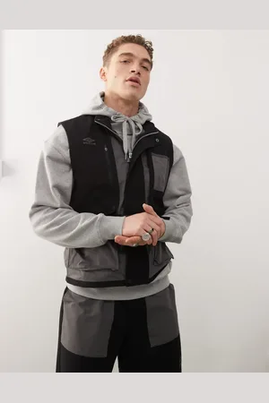 Umbro Chaleco y gris con bolsillos de