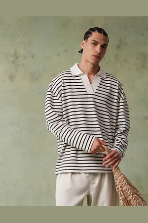 ASOS Polo blanco y negro a rayas texturizadas extragrande con hombros caídos de