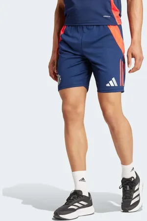 adidas Pantalones cortos deportivos rojo intenso y azul añil nocturno con diseño del Manchester United Tiro 24
