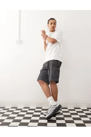 Champion Pantalones cortos cargo negros de tejido liso de