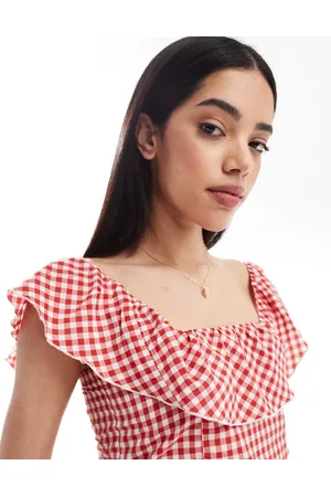 Esmée Top playero corto a cuadros vichy rojos con detalle de volante exclusivo de Esmee
