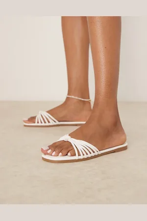 Raid Sandalias blancas planas con diseño de tiras y detalle anudado Bella de