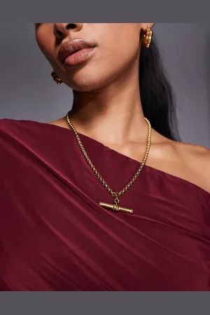 Neck On The Line Collar llamativo con detalle de barra chapado en oro de