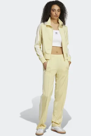 adidas Pantalones de chándal amarillo pastel Firebird de