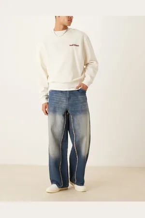 ASOS Vaqueros azul añil lavado muy holgados con bordes sin rematar de