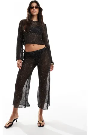 In The Style Pantalones playeros negros de pernera ancha de croché con lentejuelas de x Perrie Sian (parte de un conjunto)