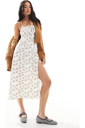 Daisy Street Vestido semilargo con estampado de florecitas, pecho fruncido y tiras cruzadas en la espalda de