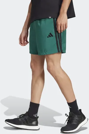 adidas Pantalones cortos verde universitario y negros con 3 rayas Chelsea Essentials de