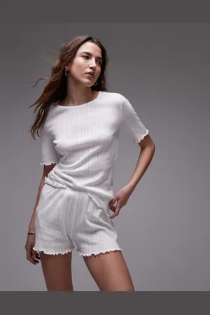 MANGO Camiseta de pijama blanca con volante en las mangas de punto pointelle de (parte de un conjunto)
