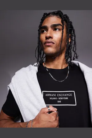 Armani Exchange Camiseta negra con logo metalizado de