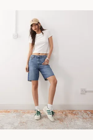 Noisy May Pantalones cortos vaqueros holgados de talle alto con lavado azul medio de
