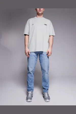 ASOS Vaqueros tapered azules con lavado claro de