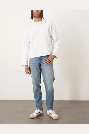 ASOS Vaqueros tapered en azul con lavado claro de