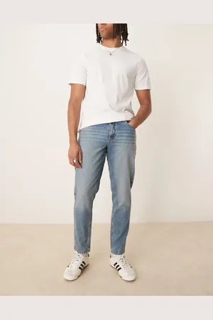 ASOS Vaqueros tapered en de